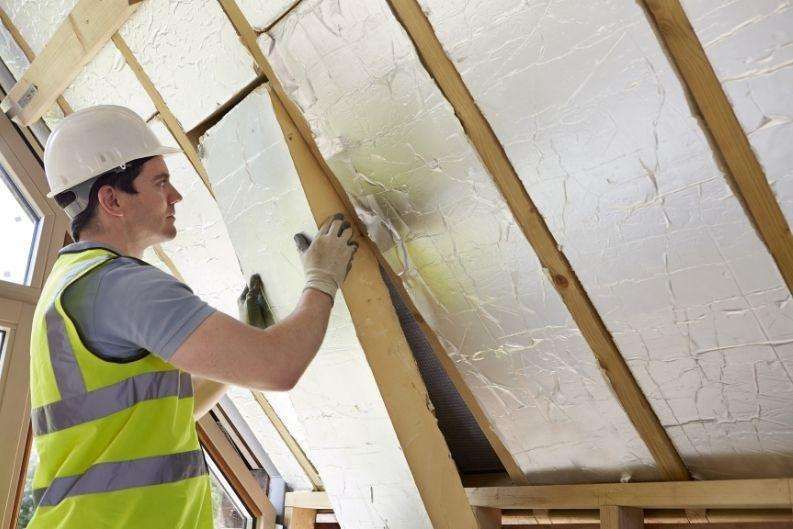 Guy Insulating a Home